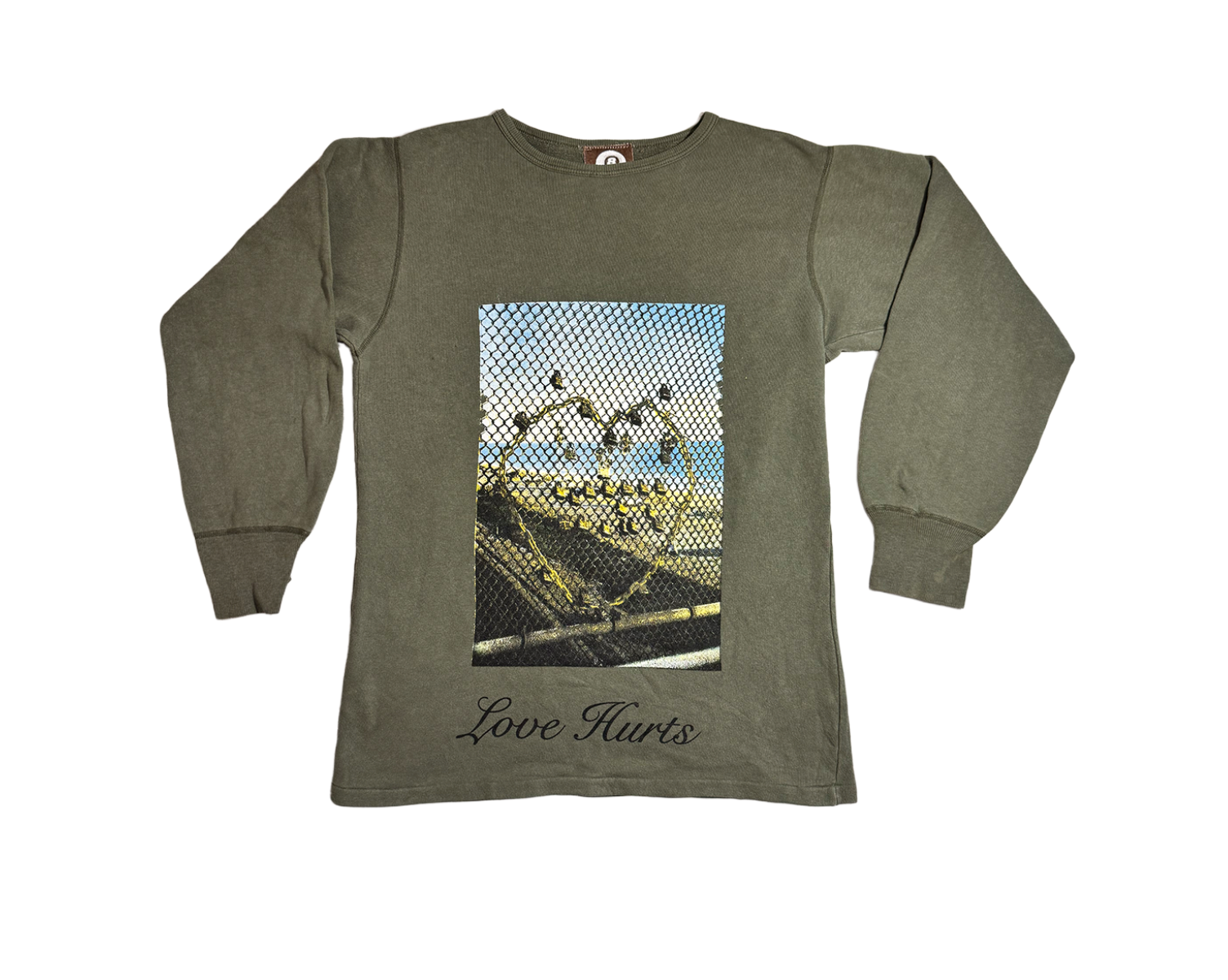 LOVE HURTS SWEATER